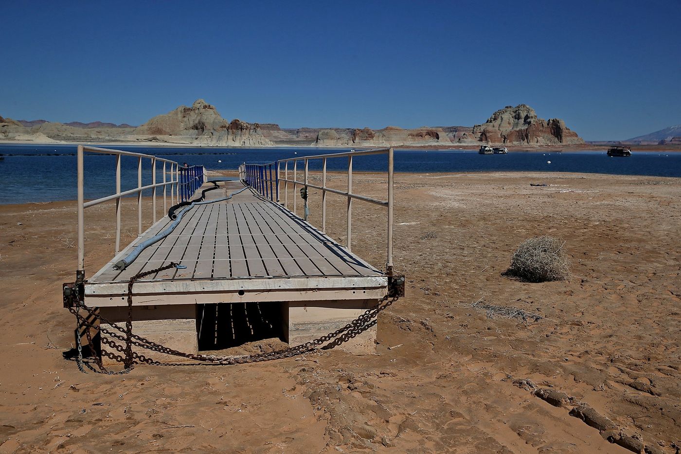 A gangplank sits on what is now dry lakebed at Lake Powell in Arizona