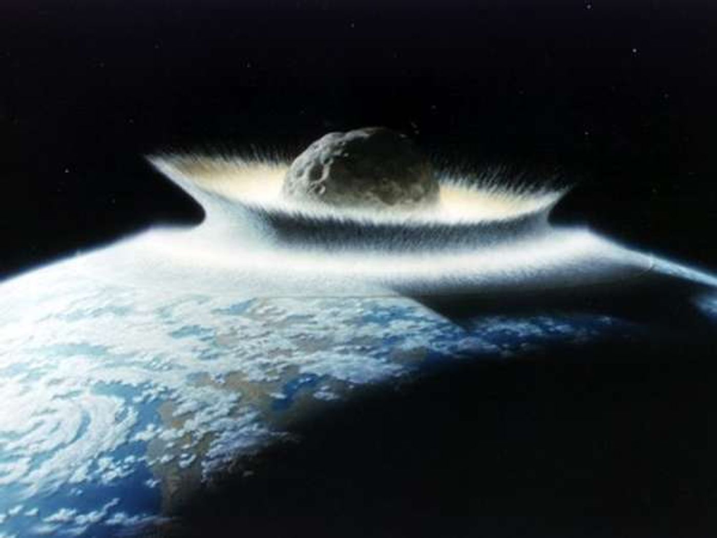 An artist's depiction of a 6-mile wide asteroid that impacted the Earth 65 million years ago