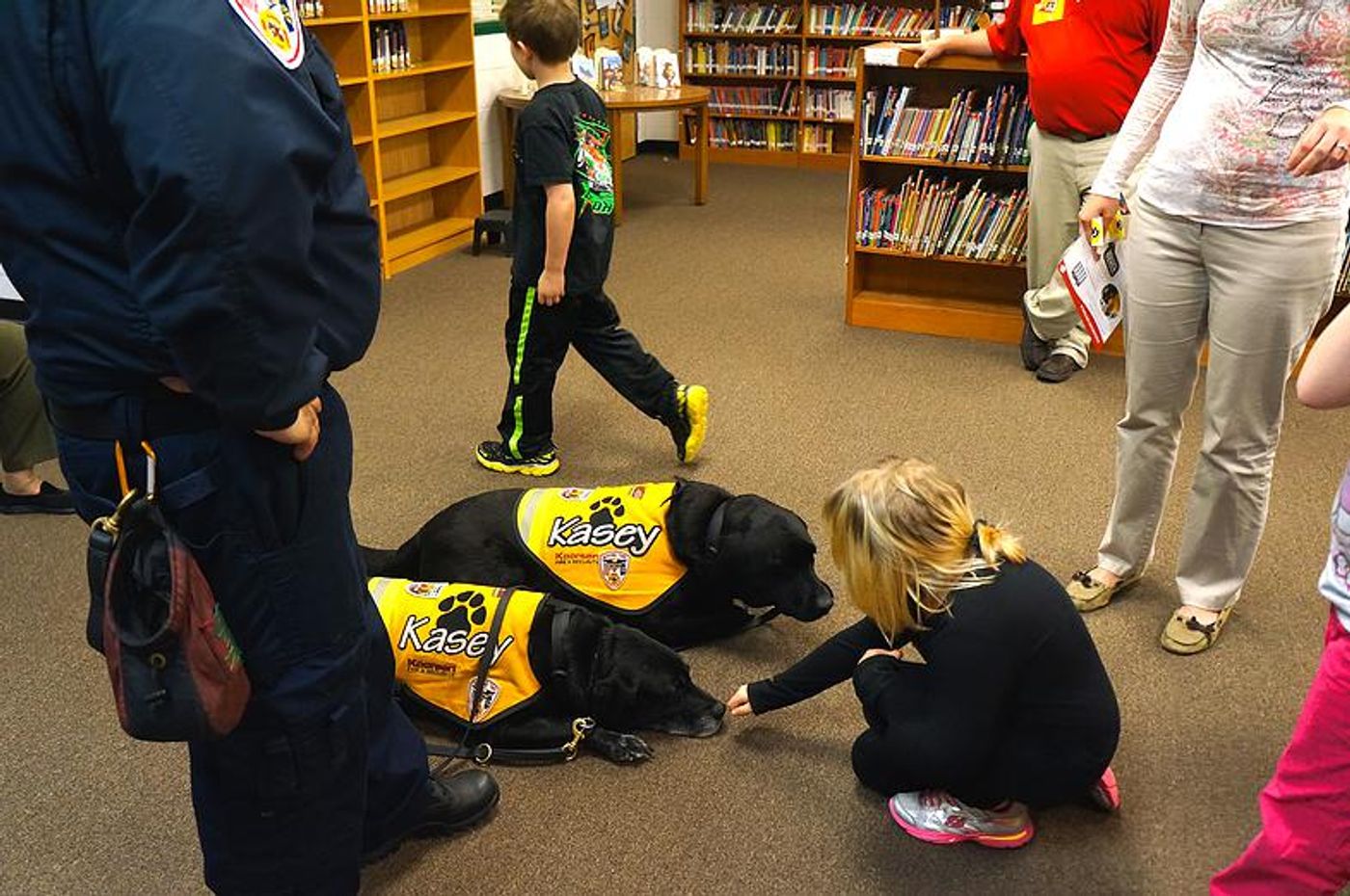 Black labs are the stars of the show in this fire safety program