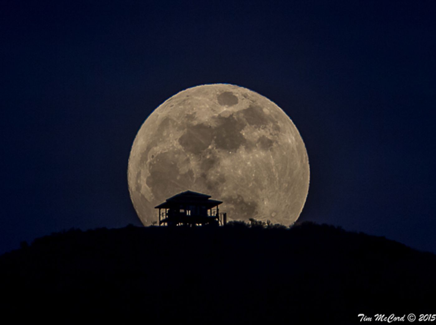 The smallest full moon of the year rises over Entiat, Washington on March 4, 2015