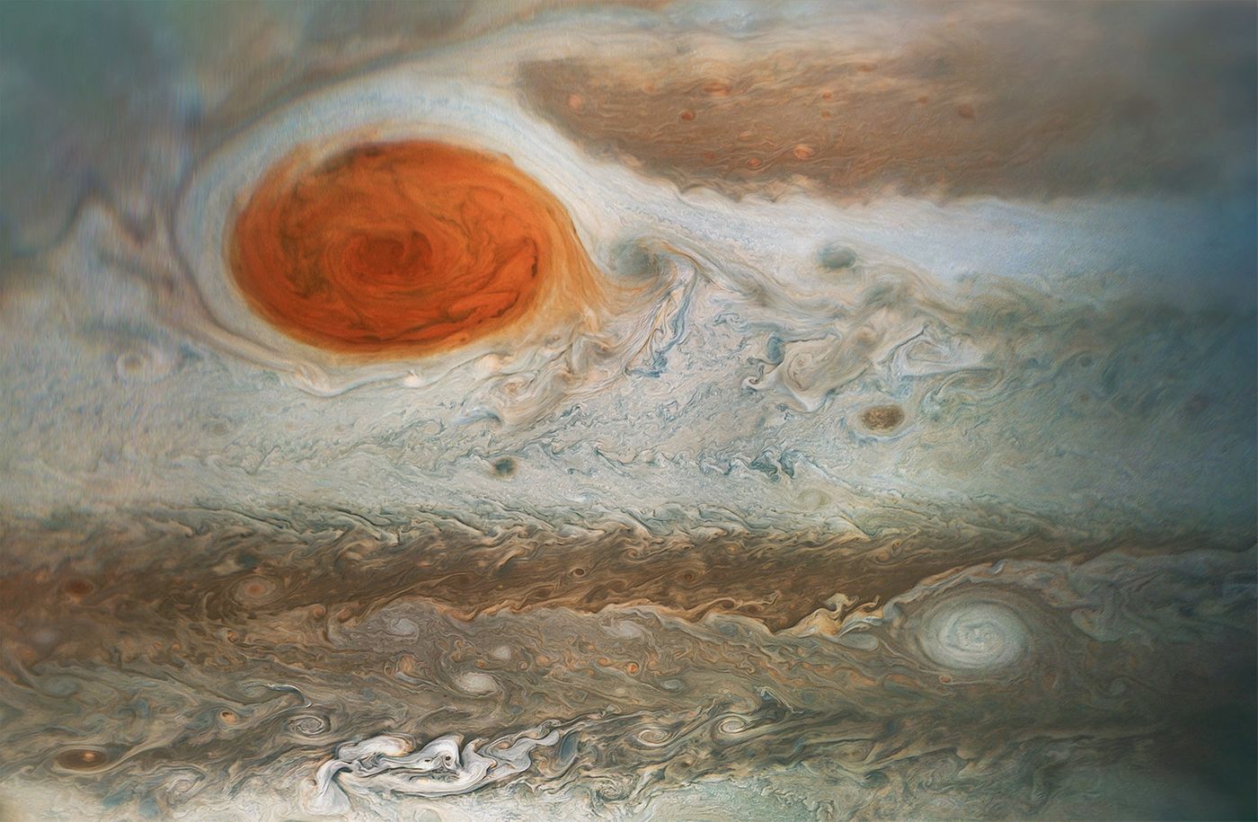 A color-enhanced combination of 3 images taken on April 1, 2018 as Juno performed its 12th close flyby of Jupiter. Juno was 15,379 miles (24,749 kilometers) to 30,633 miles (49,299 kilometers) from the tops of the clouds of the planet. / Credit: NASA/JPL-Caltech/SwRI/MSSS/ Gerald Eichstädt /Seán Doran