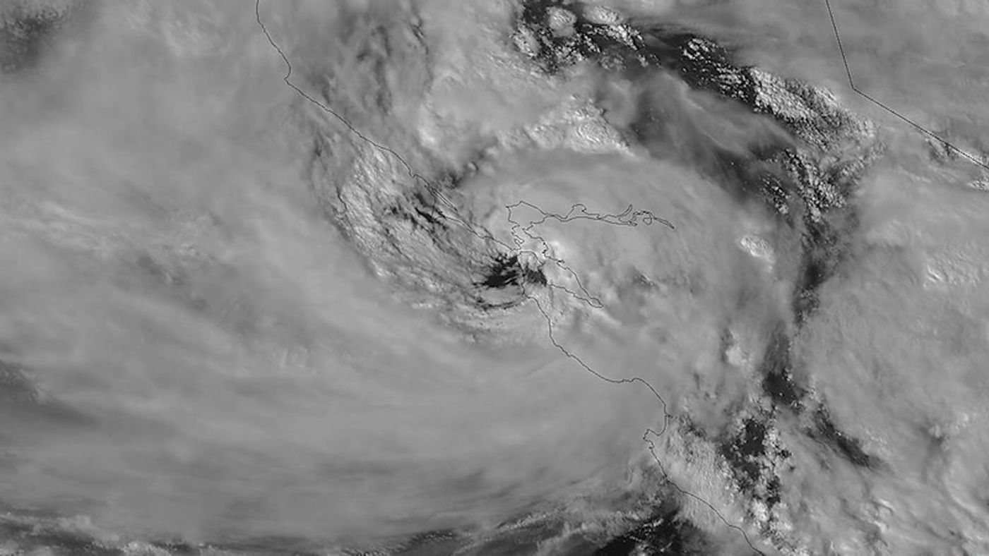 This visible imagery from GOES-18 (GOES West) shows the mid-latitude cyclone fueled by an atmospheric river. The cyclone formed a hurricane-like eye when two low pressure areas converged over San Francisco.   /  Image credit: NOAA