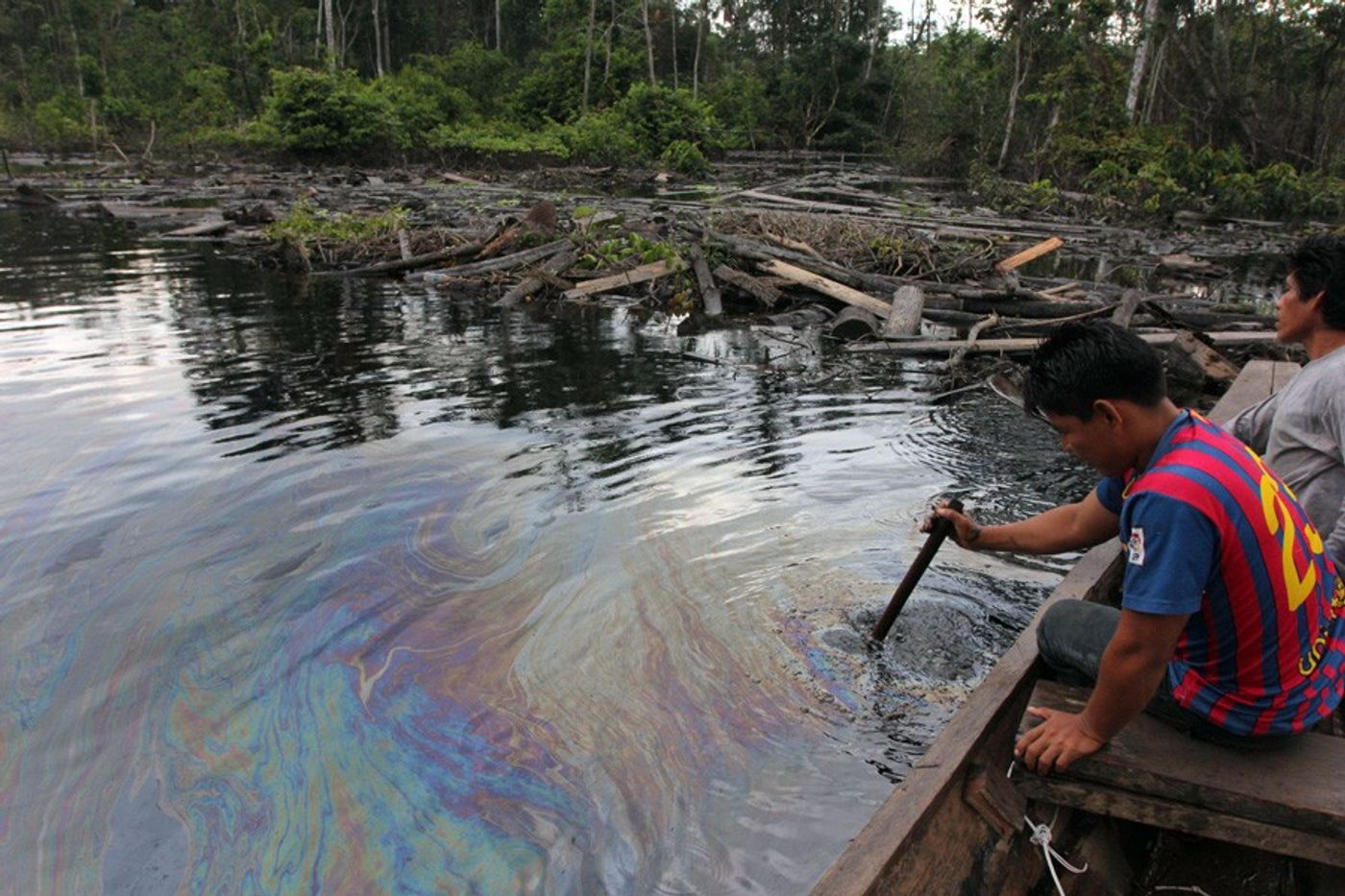 Oil makes the rivers shiny in Peru. Photo: Mongabay News