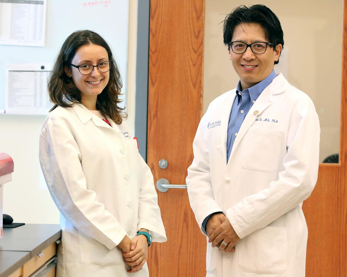Graduate student Alessandra Metelli (left) and Zihai Li (right), MD, PhD, chair of the Department of Microbiology and Immunology at the MUSC Hollings Cancer Center. Source: Medical University of South Carolina