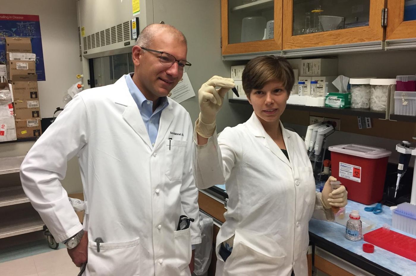 Borna Mehrad, MBBS (left), and Kathryn Michels, both of the University of Virginia School of Medicine, have identified a hormone that helps the body fight off the spread of bacterial pneumonia. The discovery may offer a simple way to help vulnerable patients. Credit: Josh Barney | UVA Health System