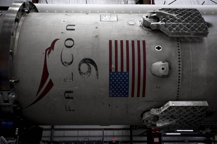 A used SpaceX Falcon 9 rocket sits in SpaceX's stockpile.