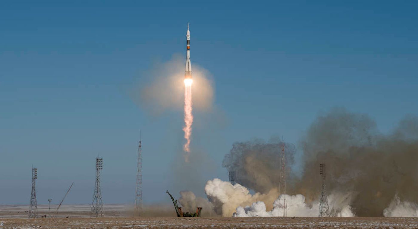 A Russian Soyuz spacecraft launches from the Baikonur Cosmodrome on Sunday, carrying three new crew members for the International Space Station.