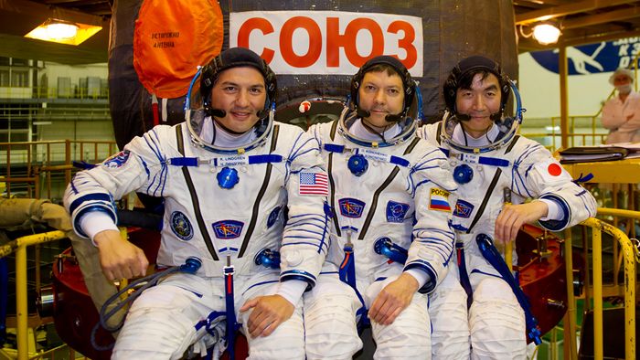 Three spacemen returned to Earth from the International Space Station on Friday.