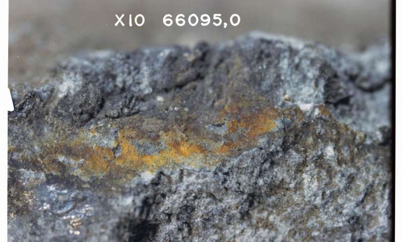 Surface rust on this lunar rock tells a story about the Moon's formation.