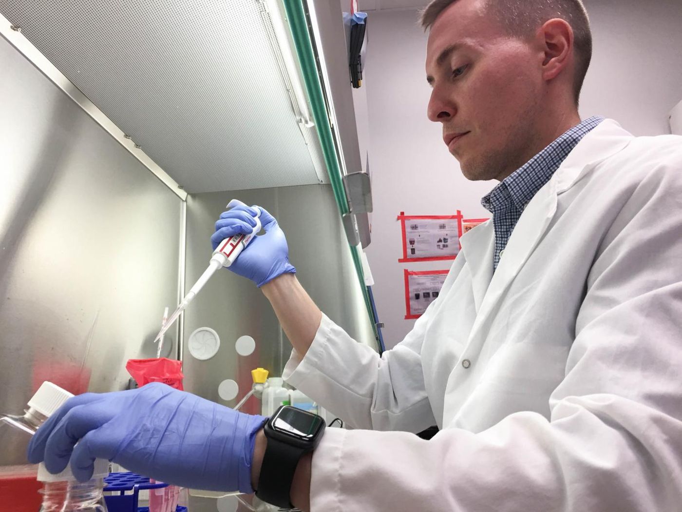 Jacob Yount conducts lab research at The Ohio State University College of Medicine. Yount led a new study that links heart complications from the flu with a common gene mutation. / Credit: The Ohio State University Wexner Medical Center