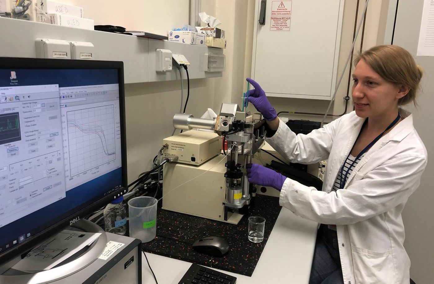 Lisa-Marie Funk, co-first author, analysing the mechanism of a protein using specialist biophysical methods in the lab./  Credit: Nora Eulig