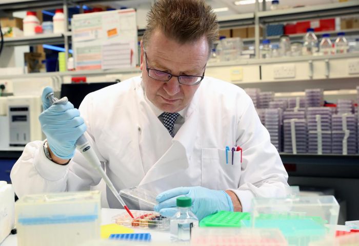 Professor Sewell at work in the lab. / Credit: Cardiff University