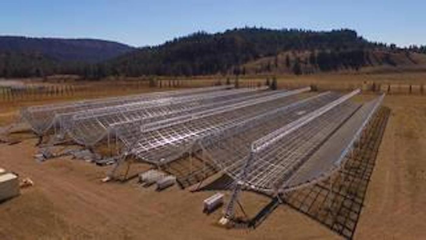 This aerial view shows the Canadian Hydrogen Intensity Mapping Experiment (CHIME), a radio telescope located at Dominion Radio Astrophysical Observatory in British Columbia. / Credits: Richard Shaw/UBC/CHIME Collaboration