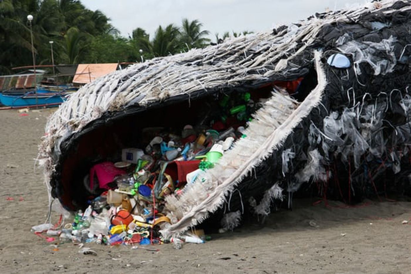 Greenpeace model of a whale dead from plastic.  Photo: Greenpeace