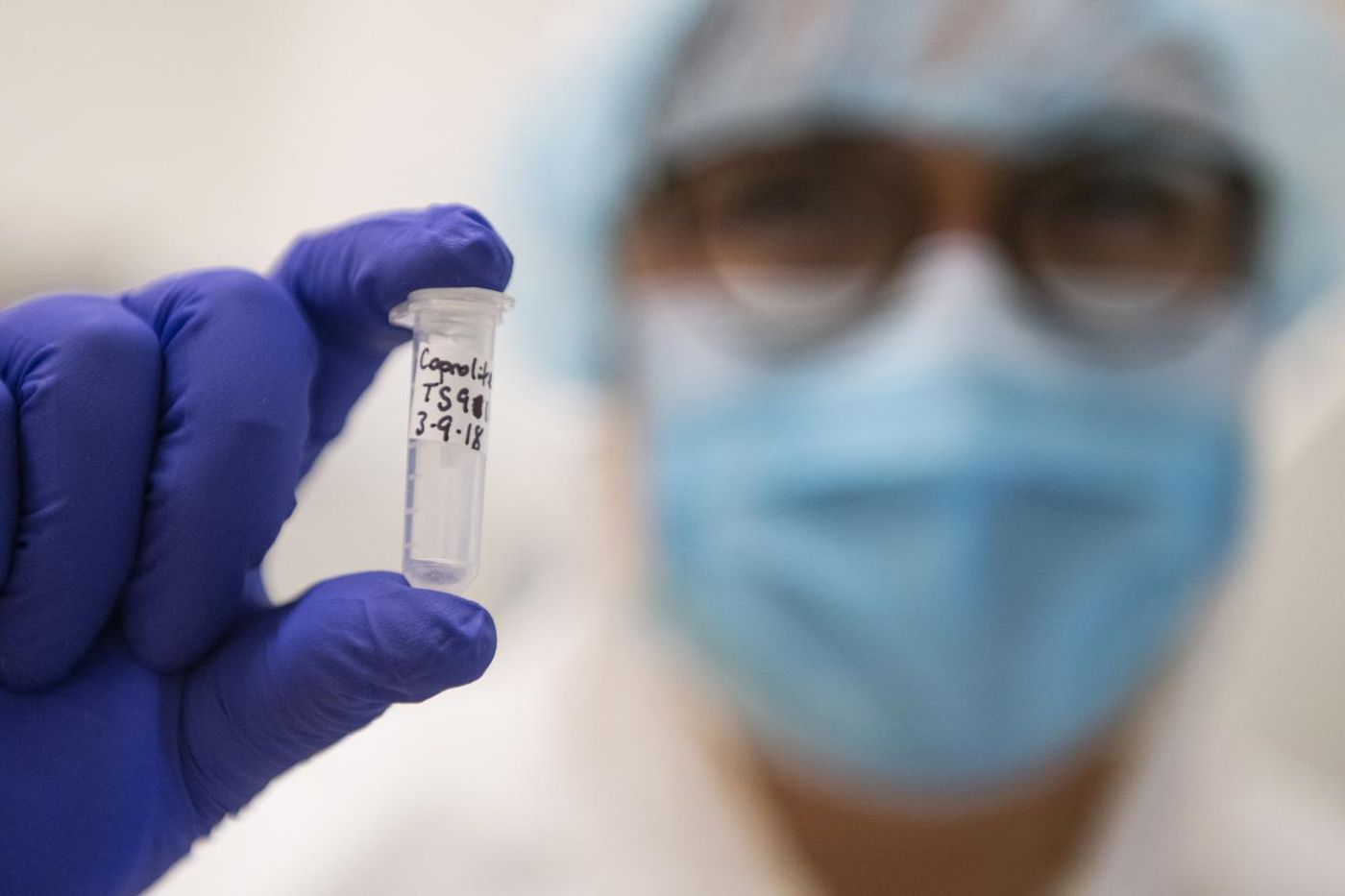 University of Montana researcher Meradeth Snow holds a vial containing ancient human DNA. / Credit: UM photo by Tommy Martino