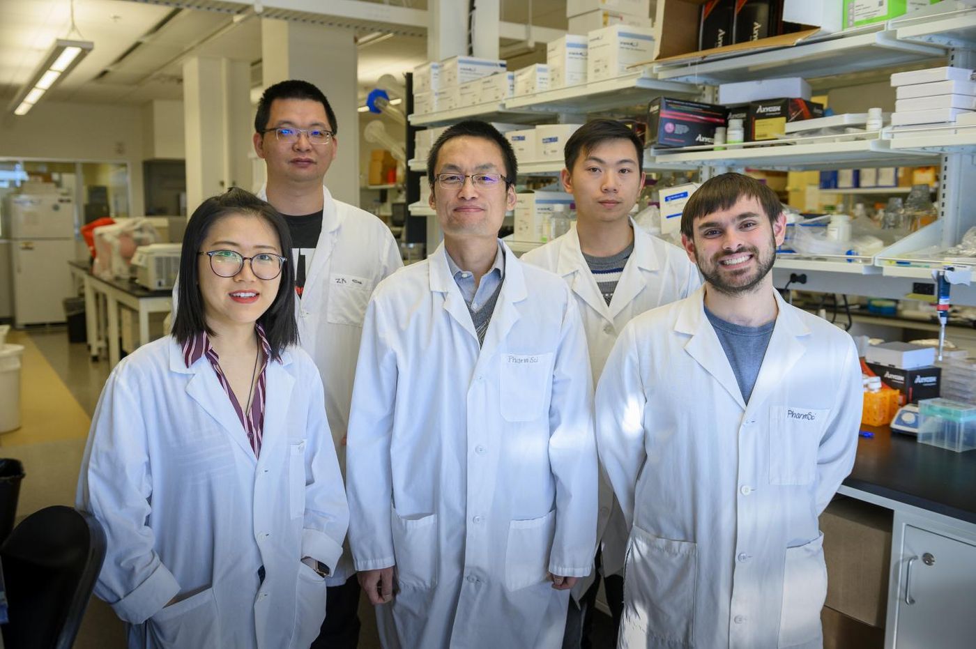 From left to right, study authors Yuening Liu, Peng Xia, Zhaokang Cheng, and Jingrui Chen and graduate student Joshua Gallo. / Credit: Cori Kogan, WSU Health Sciences Spokane