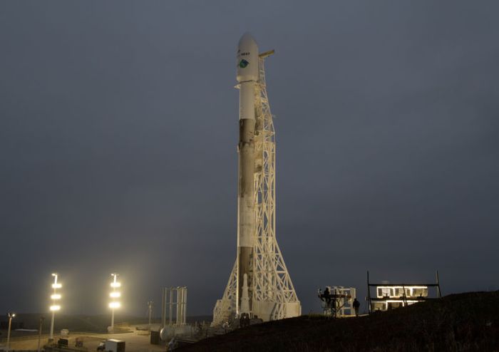 SpaceX's Falcon 9 rocket stood tall at its launch pad in California Tuesday afternoon before launch.