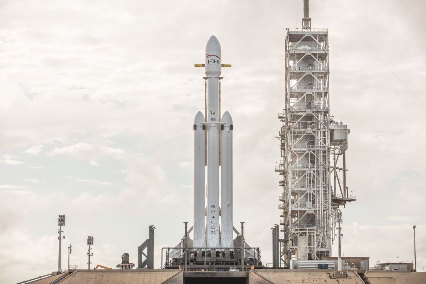A day shot of the SpaceX Falcon Heavy rocket as it stands tall at launchpad 39A.