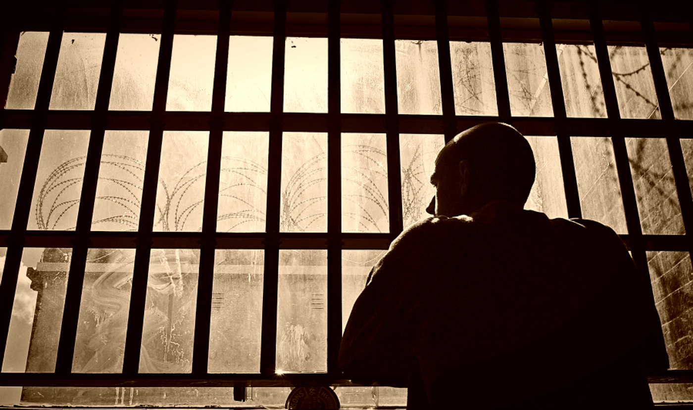 image of person in prison, credit: Chenôve TabJeunesse