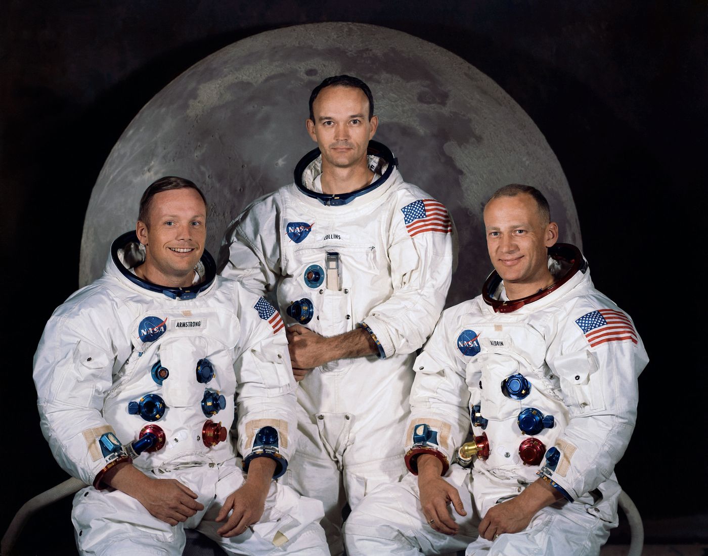 Apollo 11 crew, who made the first manned landing: commander Neil Armstrong, CM pilot Michael Collins, and LM pilot Buzz Aldrin