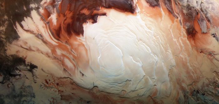 South Pole of Mars imaged by Mars Express in green, infrared, and blue light with its High Resolution Stereo Camera. (Credit: European Space Agency/DLR/FU Berlin/Bill Dunford)