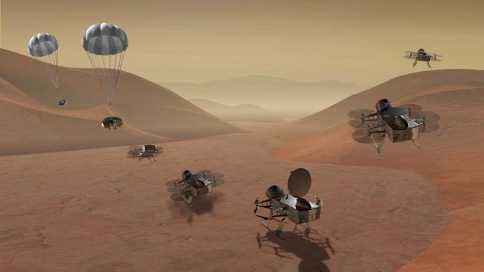 An artist's impression of the Dragonfly quadcopter vehicle as it descends from Titan's atmosphere.
