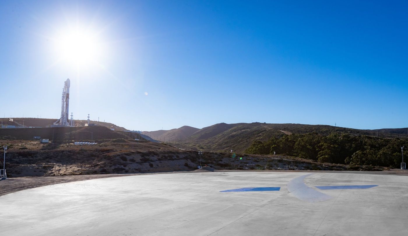 SpaceX's Falcon 9 rocket stands tall at Vandenverg Air Force Base, awaiting launch instructions.