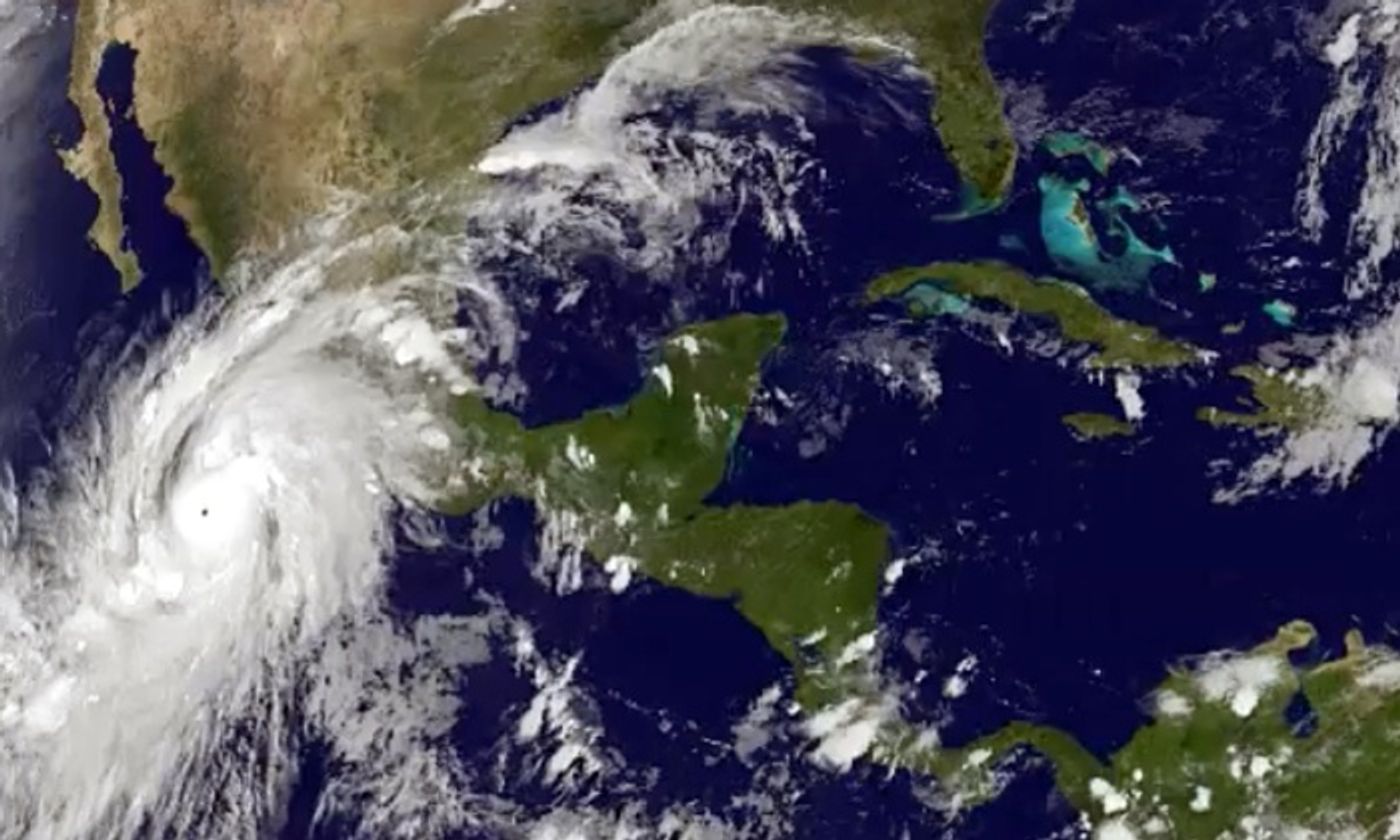 A satellite image showing Hurricane Paricia moving over Mexico's Pacific Coast.