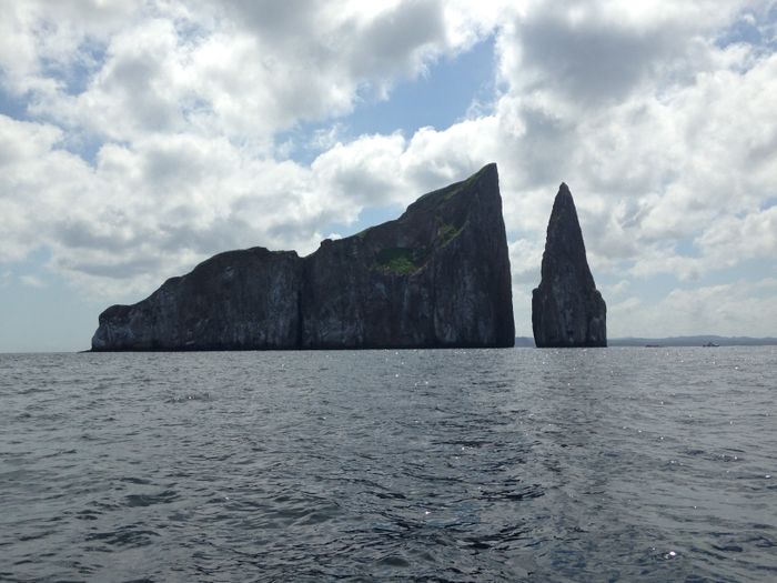 Marine rocks like this one, known as León Dormido or Kicker Rock, make up the Galapagos. Photo: Author
