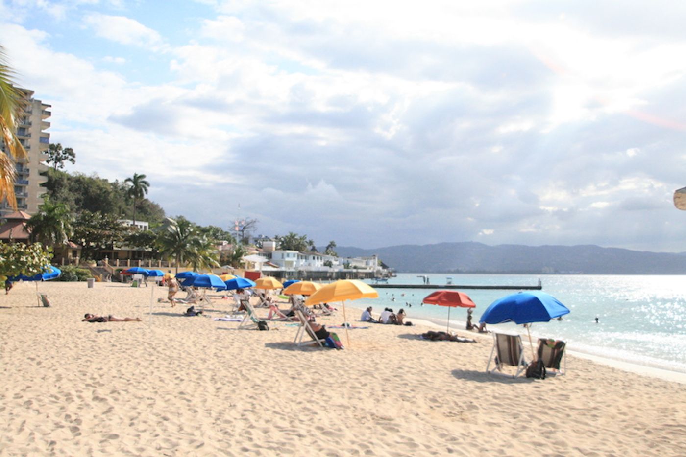 On a sunny day in Montego Bay, Jamaica, an umbrella might not be enough to shield you from the rays of the sun. / Credit: Carmen Leitch