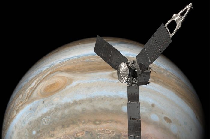 An artist's impression of Juno flying past the Great Red Spot of Jupiter.