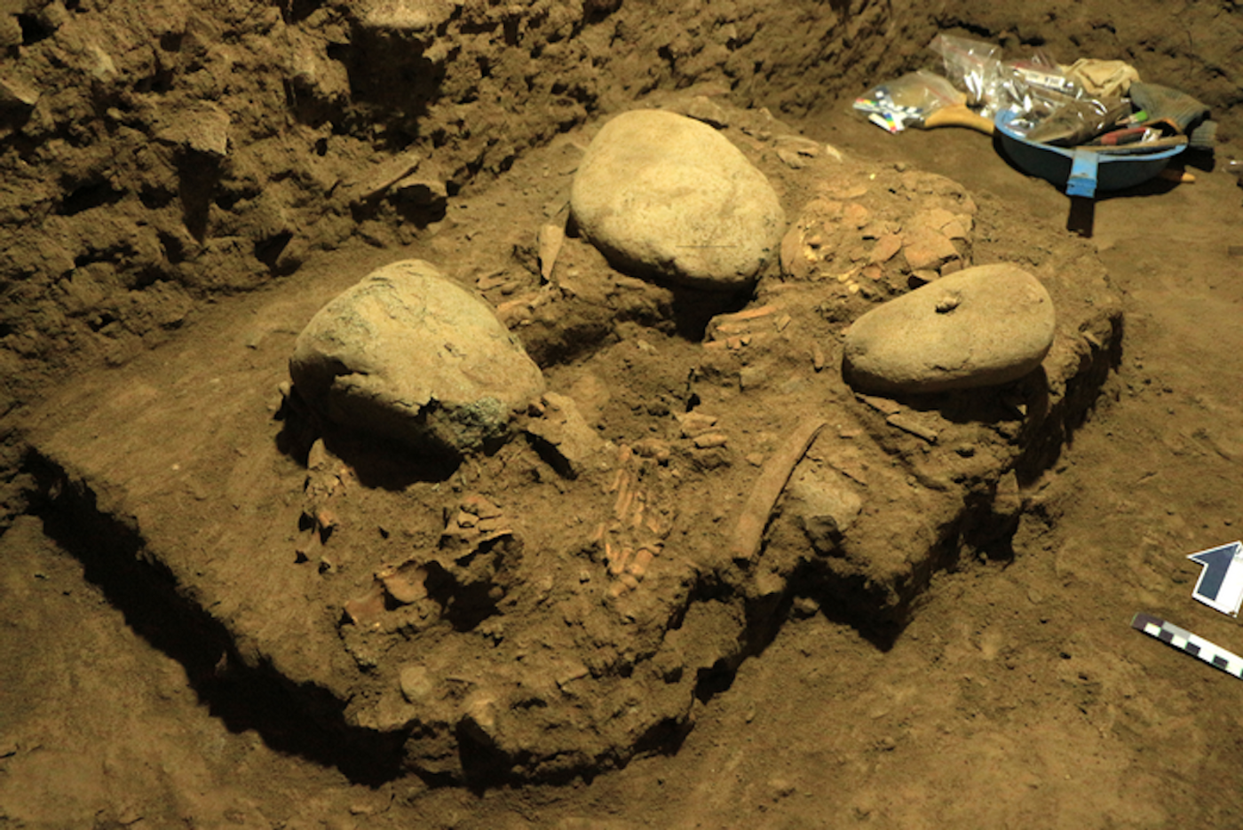 Excavations at the Leang Panninge site, and the skeleton as found. / Credit: Hasanuddin University, Indonesia