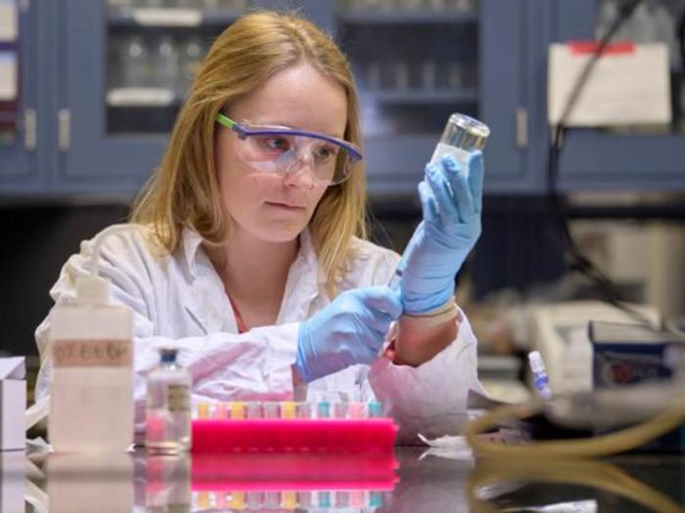 Montana State University microbiology doctoral student Lisa Keller samples cultures in the Boyd Lab / Image credit: MSU Photo by Colter Peterson