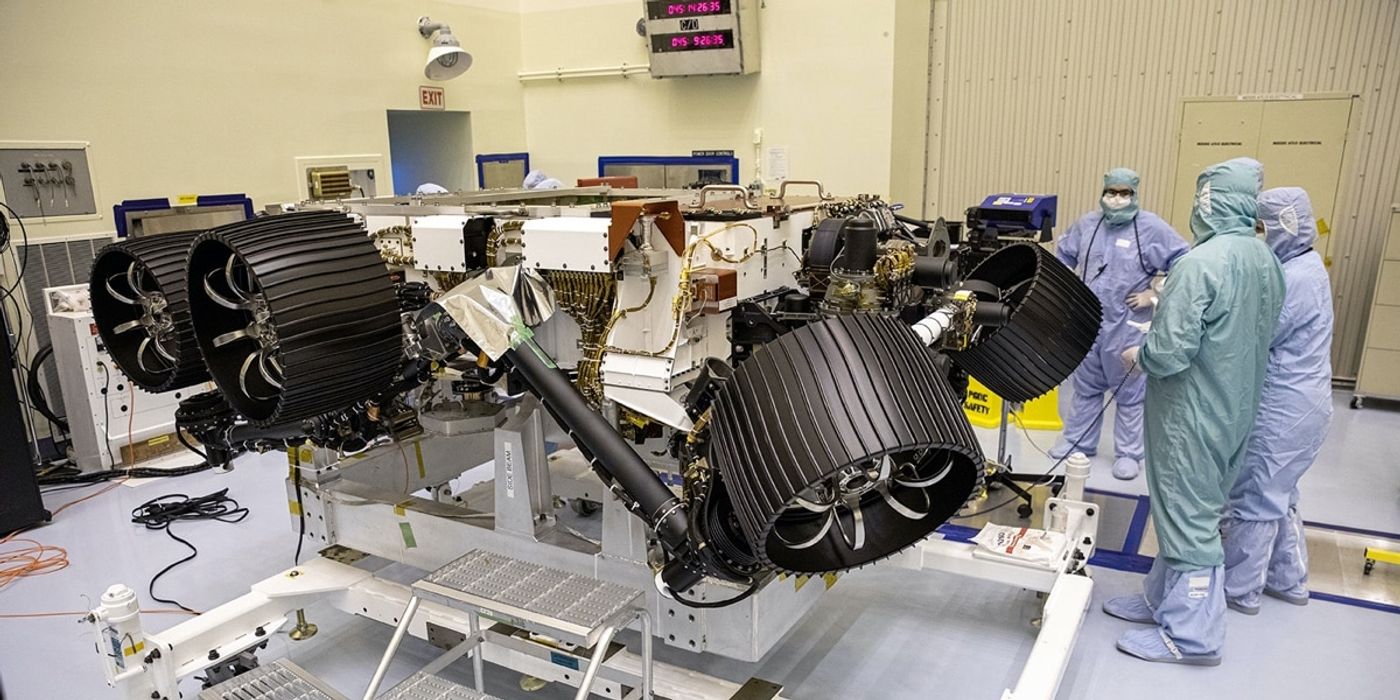 NASA engineers work on the Perseverance rover.