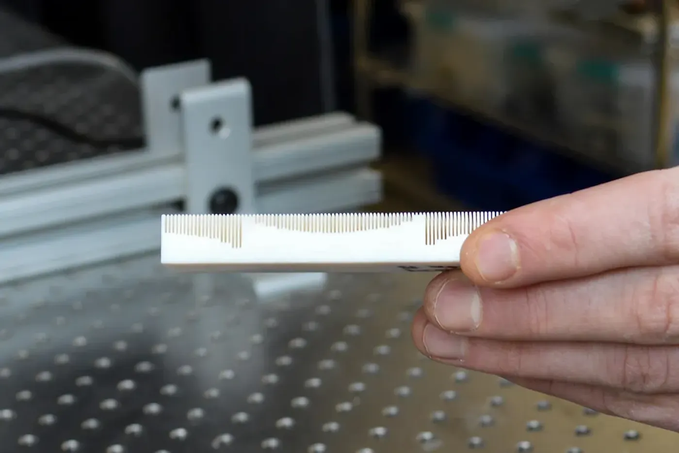 A metamaterial pattern on the surface of an object allows scientists to use sound to steer the object without physically touching it. Credit: Olivia Hultgren