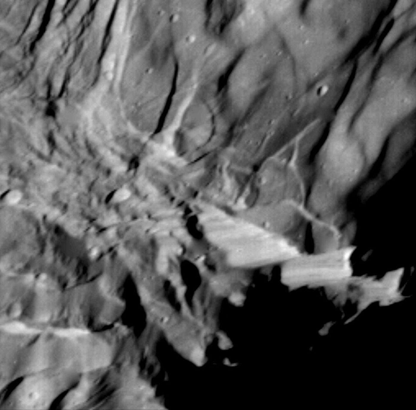 Close-up image of a potential 12 mi (20 km) high fault scarp on Miranda. (Credit: NASA/JPL)