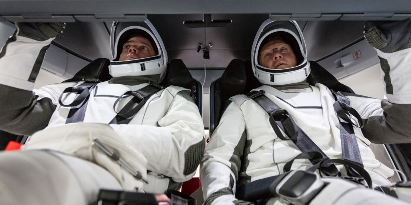 NASA astronauts Doug Hurley and Bob Behnken inside of the SpaceX Dragon spacecraft.