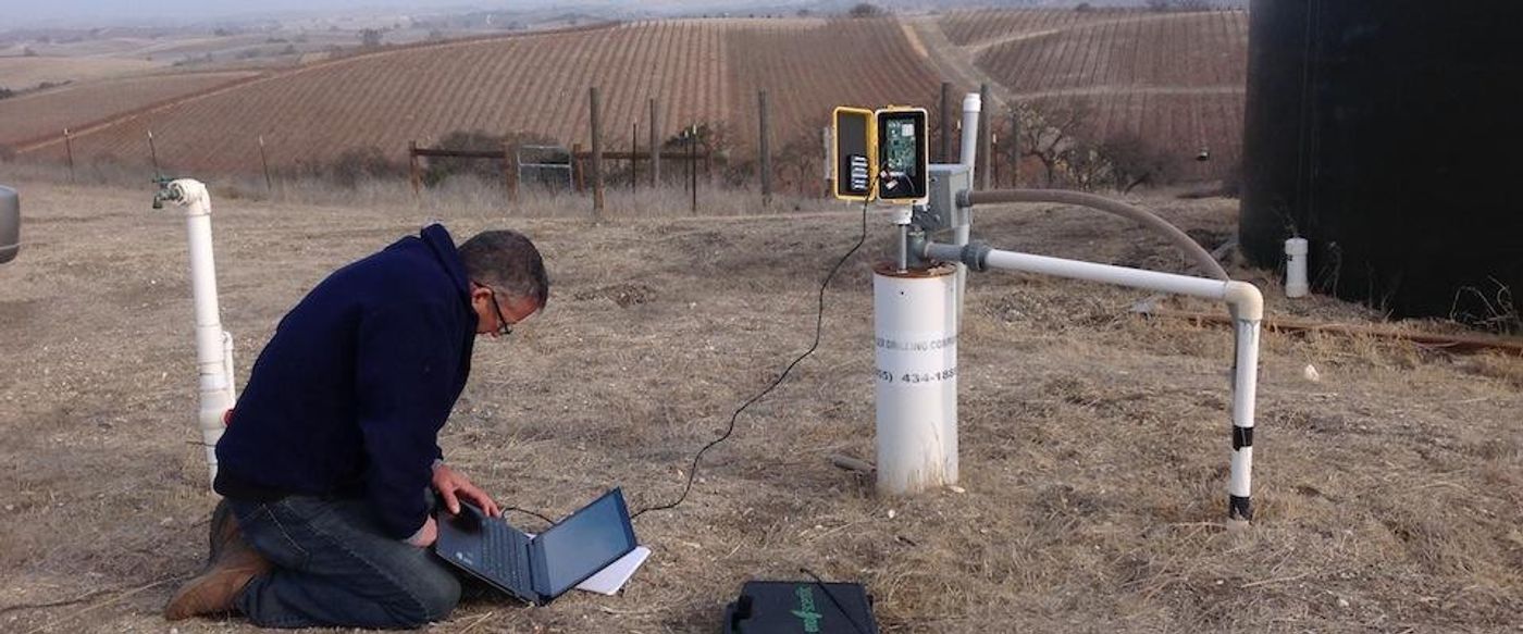 Scientist taking groundwater measurements. The new technique introduced in this study gives much more accurate readings. Photo: Cal Alumni Association - UC Berkeley