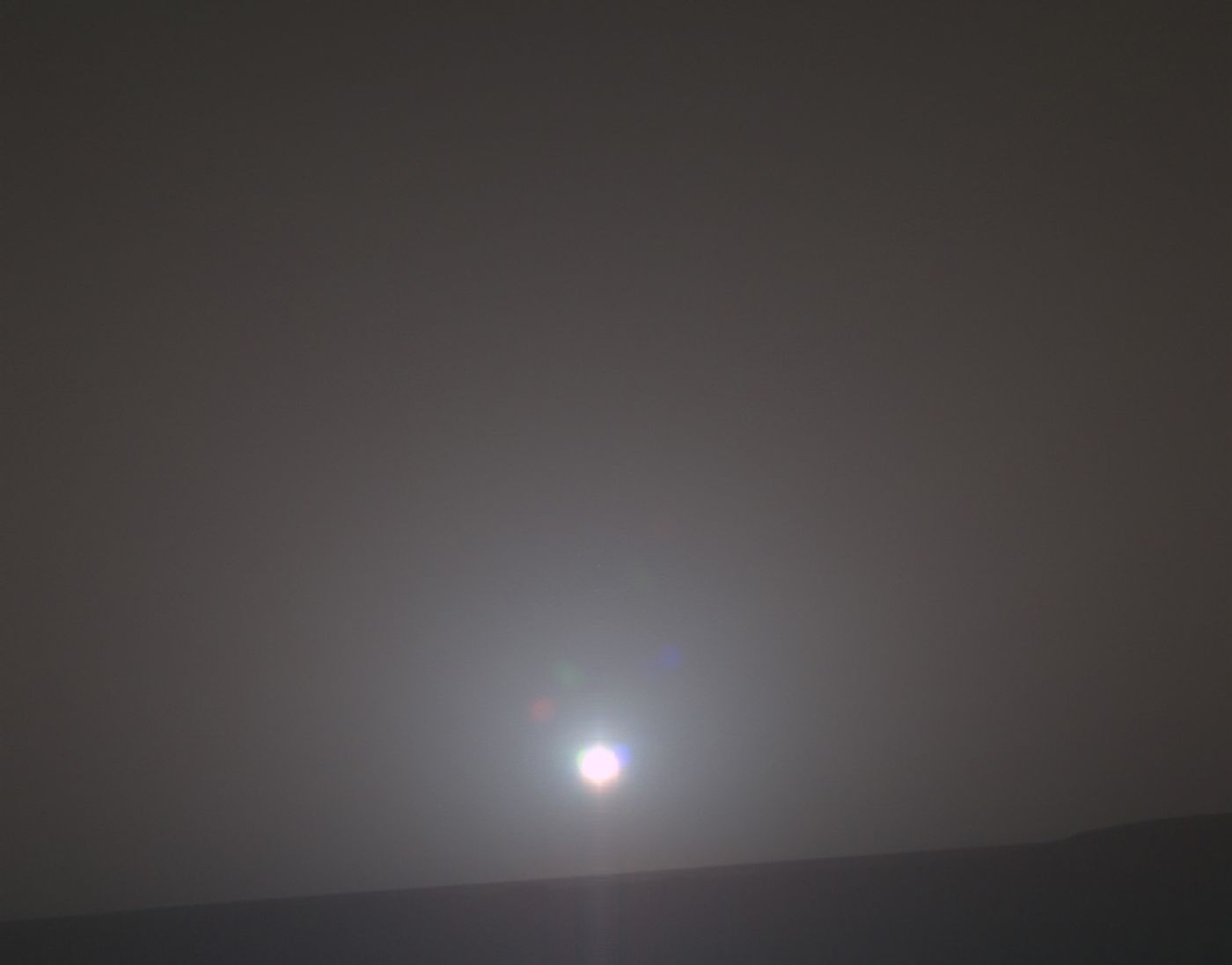 This image, captured by Opportunity's Panoramic Camera (Pancam) illustrates the rover's 4,999th sunrise.