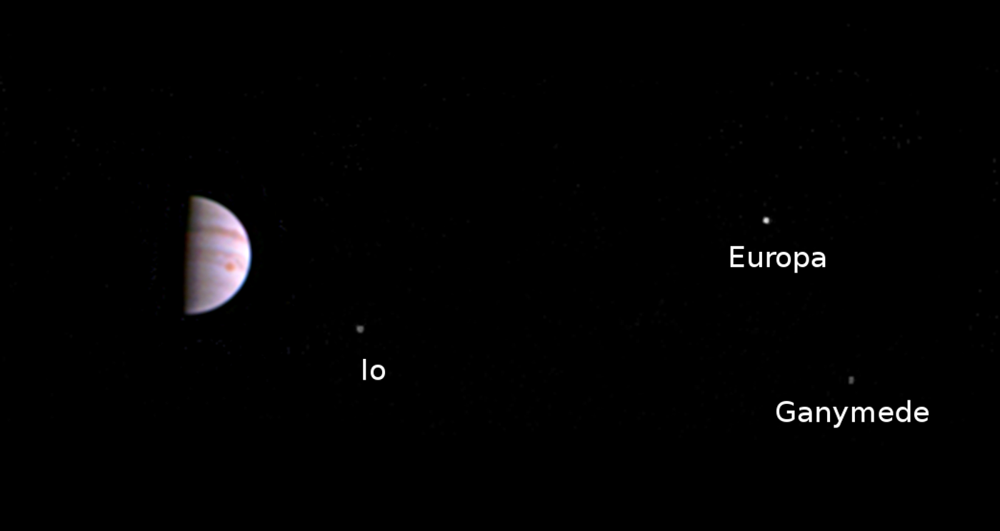 Jupiter and three of its moons, as soon from the JunoCam.