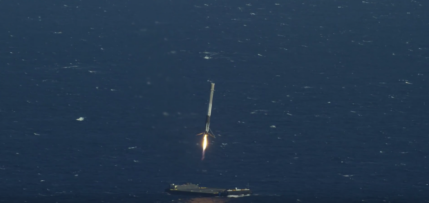 SpaceX's Falcon 9 rocket lands on a drone ship at sea after completing its primary objective.