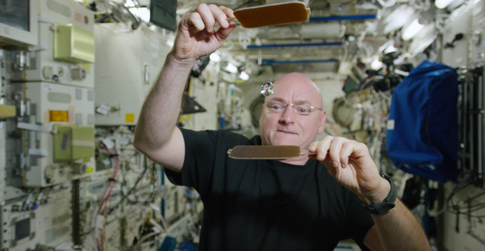 NASA's Scott Kelly plays Ping Pong in space with a ball of water.