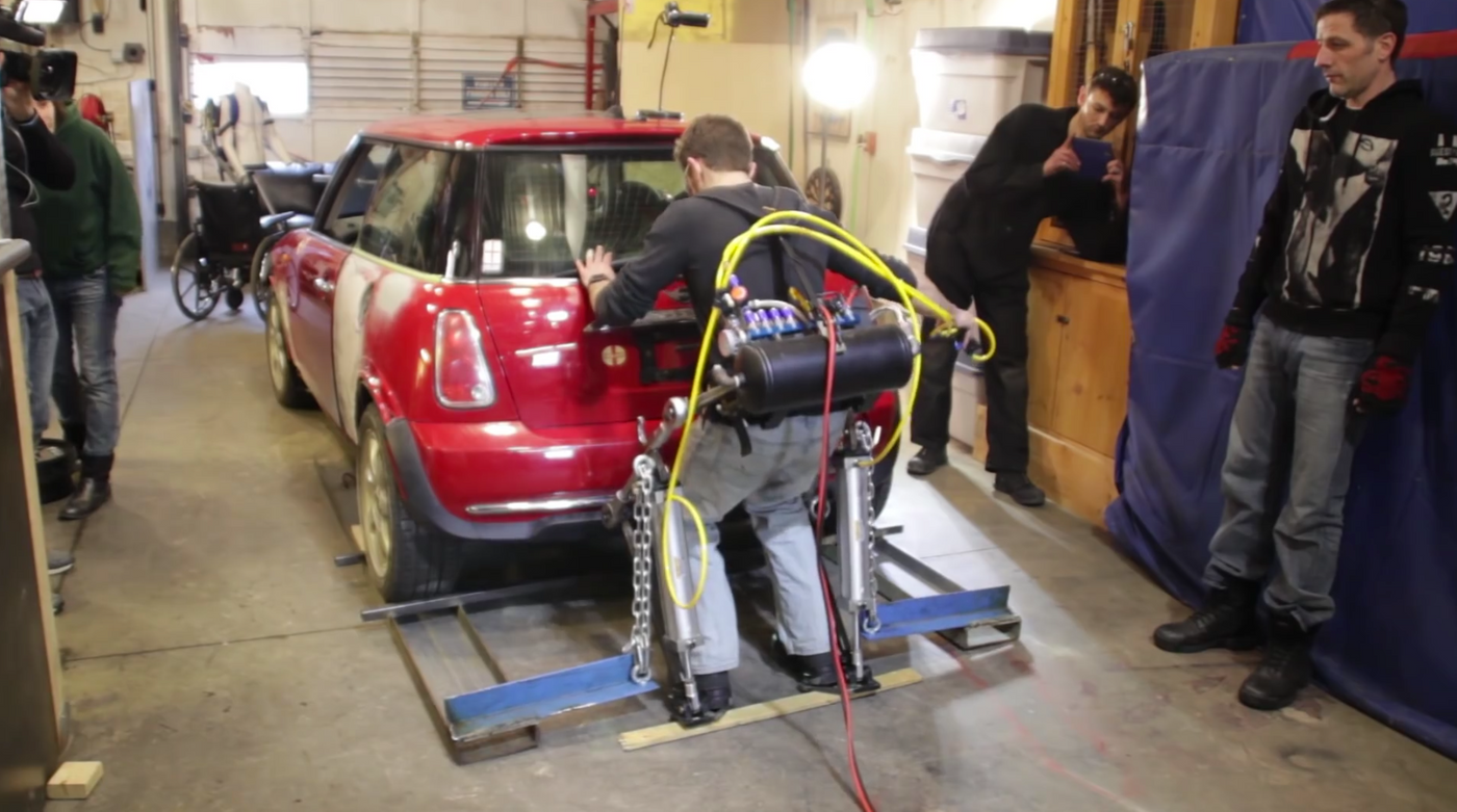 This homemade exoskeleton can pick up the rear end of a car..