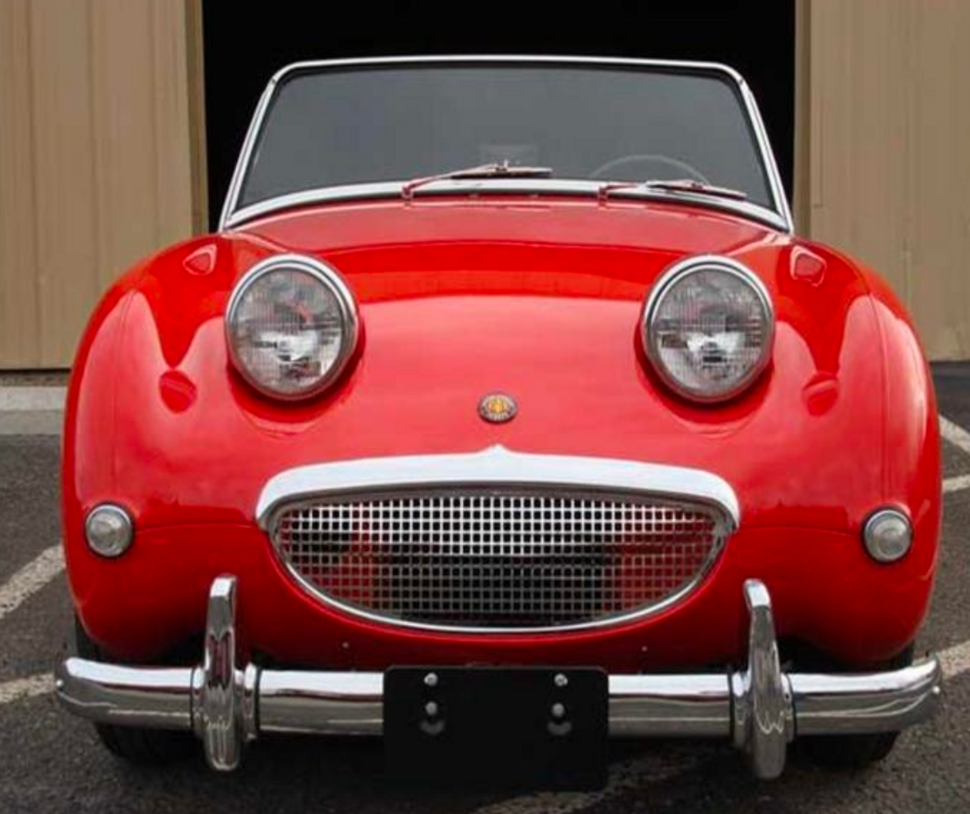 An example of a car's grille that looks like it has eyes and a mouth, despite not being designed to have a face.