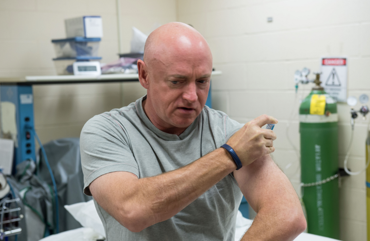View of former astronaut Mark Kelly during his lab testing and flu shot in support of the Twins Study with his brother Scott Kelly. / Credit: NASA