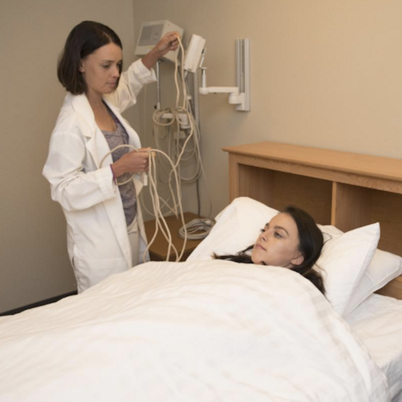 Researcher sets up for an experiment at the WSU Sleep and Performance Research Center at WSU Spokane. / Credit: WSU