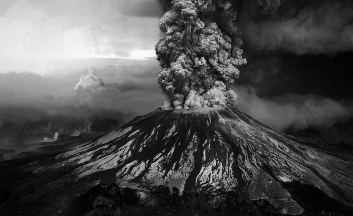 Aerial view of the May 18, 1980, eruption of Mount St. Helens as seen from the southwest. Columns of ash and volcanic gas reached heights of more than 24 km (80,000 ft) during the eruption. / Credit: USGS (U.S. Geological Survey)