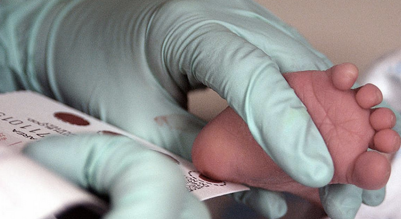 Blood is collected from a newborn for screening. / Credit: U.S. Air Force photo/Staff Sgt Eric T. Sheler