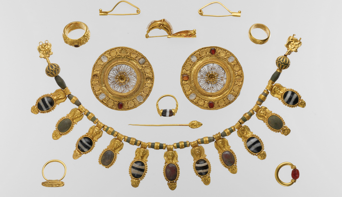 A particularly impressive set of Etruscan jewelry including rings, earrings, a dress pin, and a necklace, from the early 5th century BCE / Image credit: Public Domain, courtesy of The Metropolitan Museum of Art
