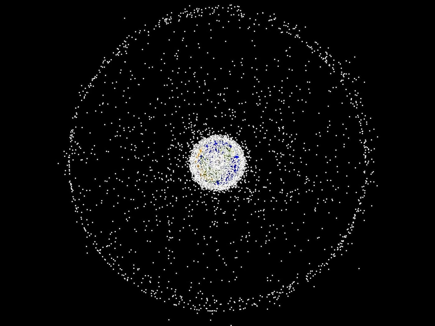 An artist's impression of the collection of space junk surrounding the Earth.